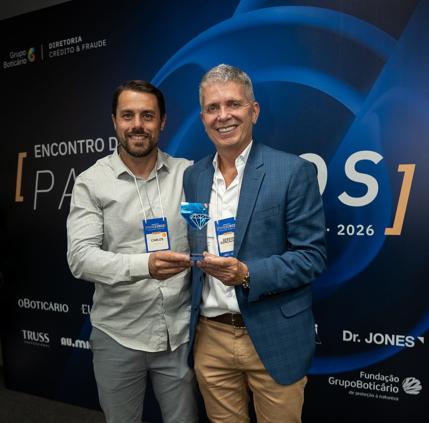 Equipe Siscobra recebendo o Prêmio Parceiro Diamante no Encontro de Parceiros do Grupo Boticário 2026